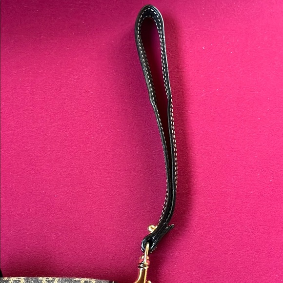 Dooney & Bourke Black and Tan Clutch Wristlet - Picture 3 of 3